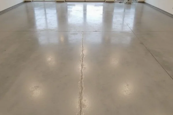 CSP 3 profiled concrete surface after coating removal ready for epoxy or overlay in Austin warehouse