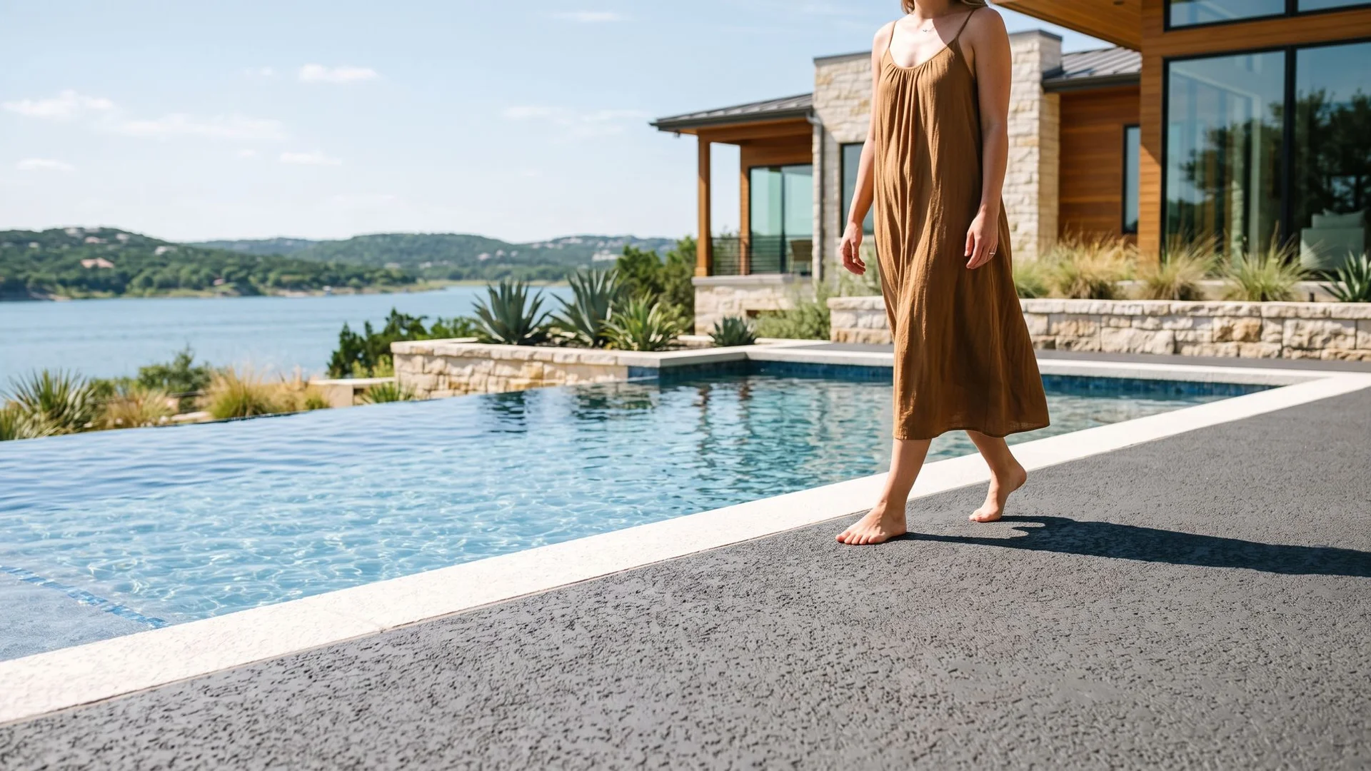 Resurfaced cool-deck pool surround at a Lakeway lakefront home